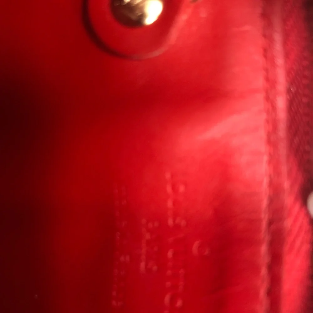 Louis Vuitton glossy red