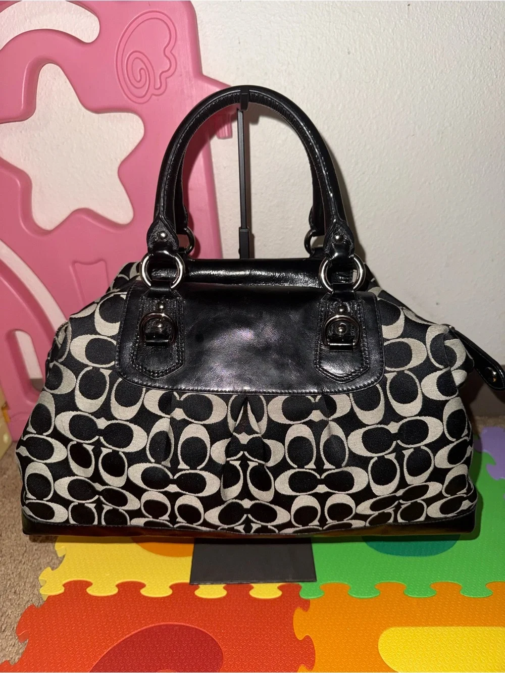 Coach satchel signature