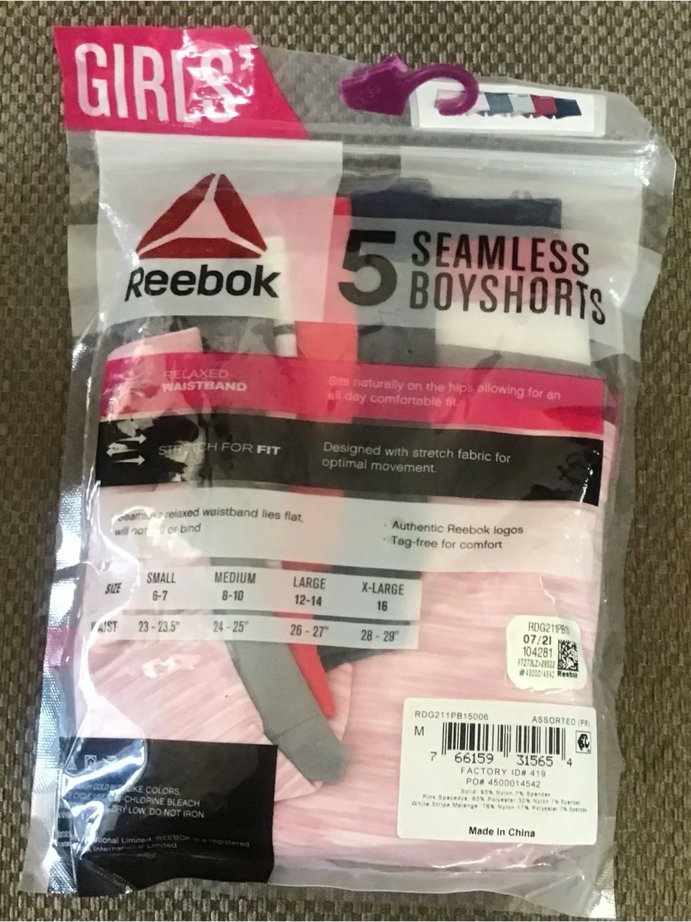Reebok •	material solid