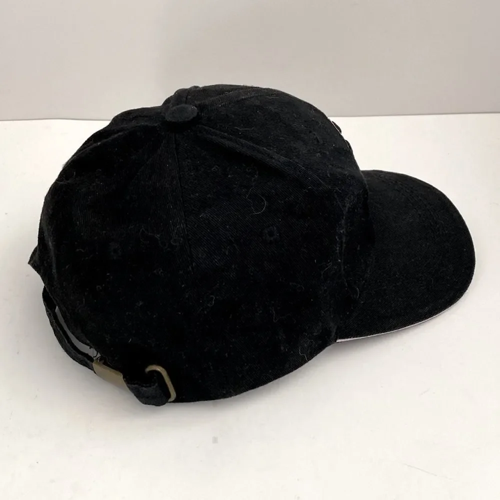 Source Unknown stylish black