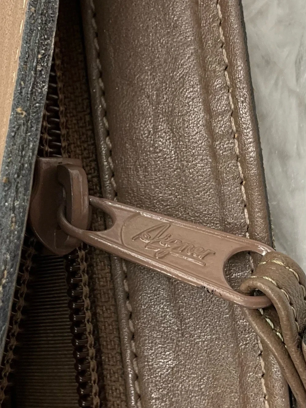 Etienne Aigner carrying fabric accent
