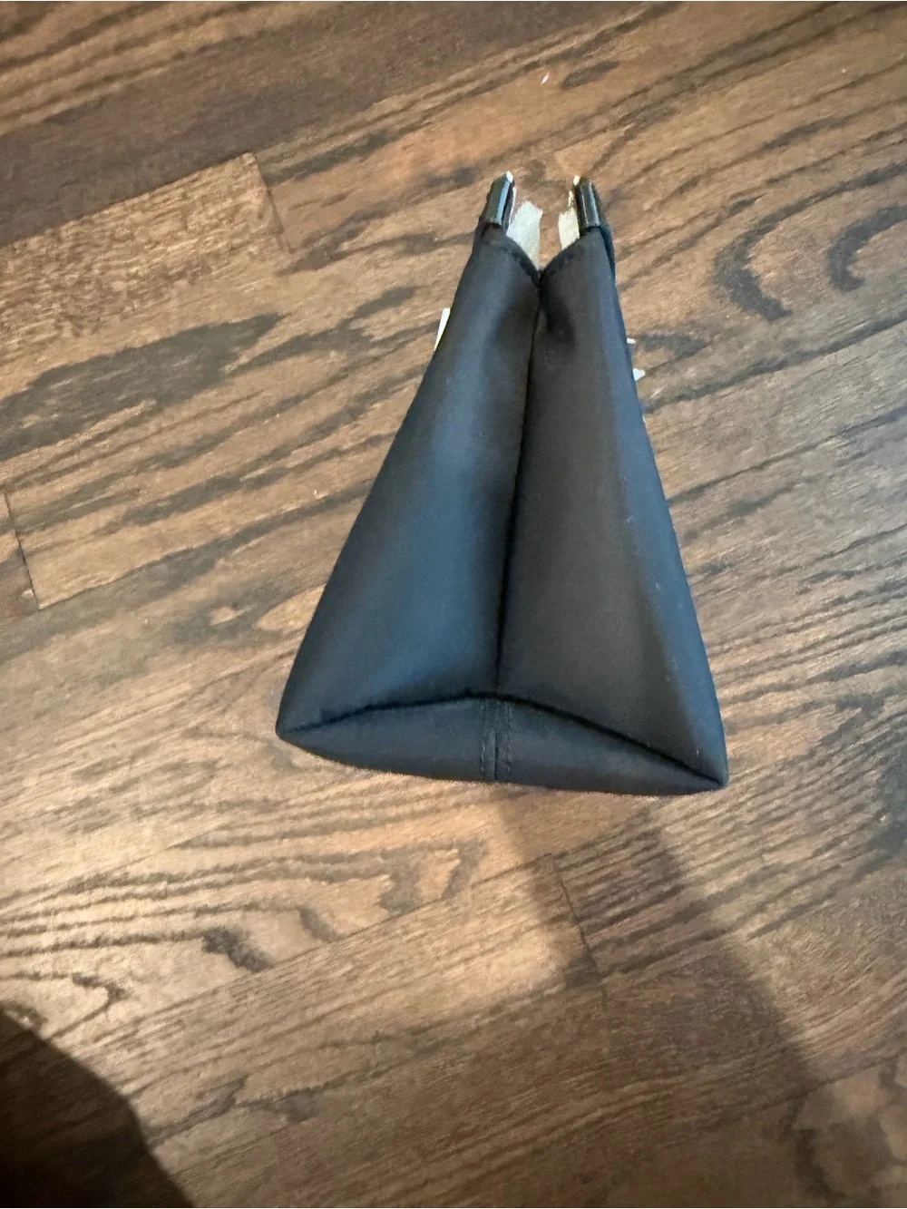kate spade black toiletry pouch with zip-top