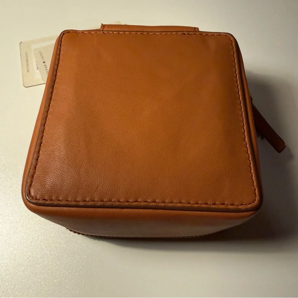 Lucky Brand case tan marks