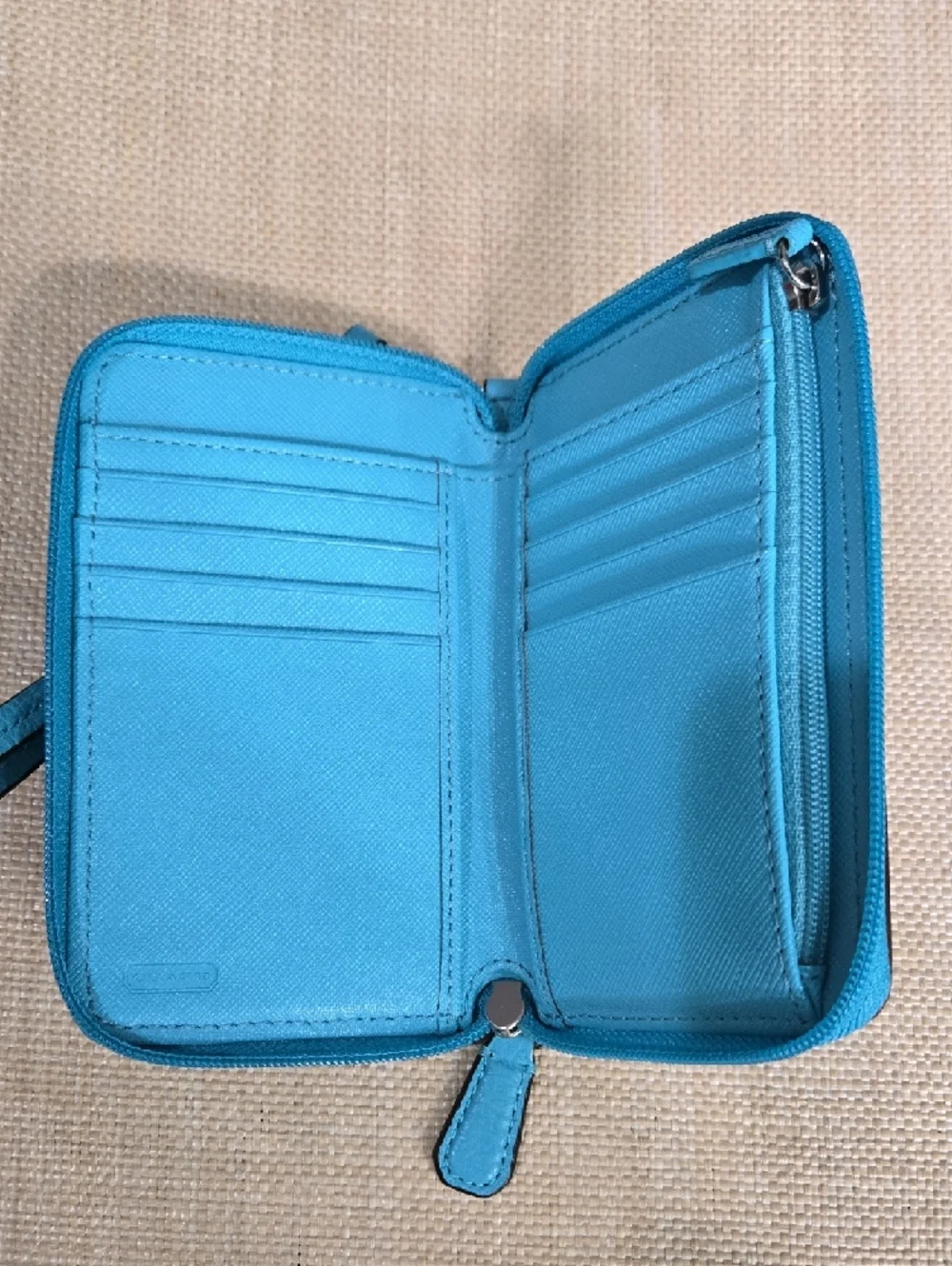 Coach wristlet crafted