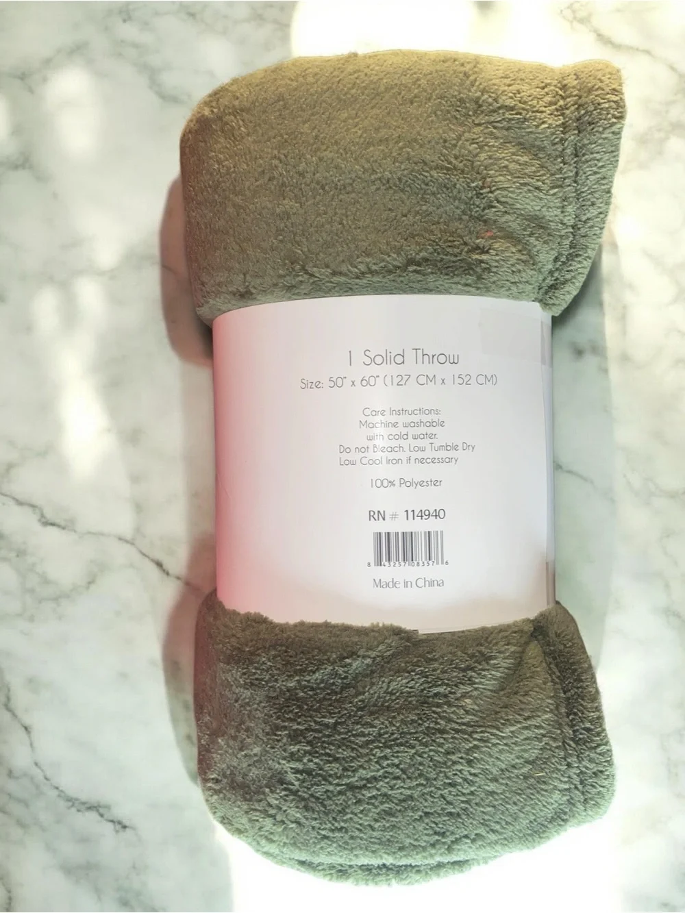Solid plush throw