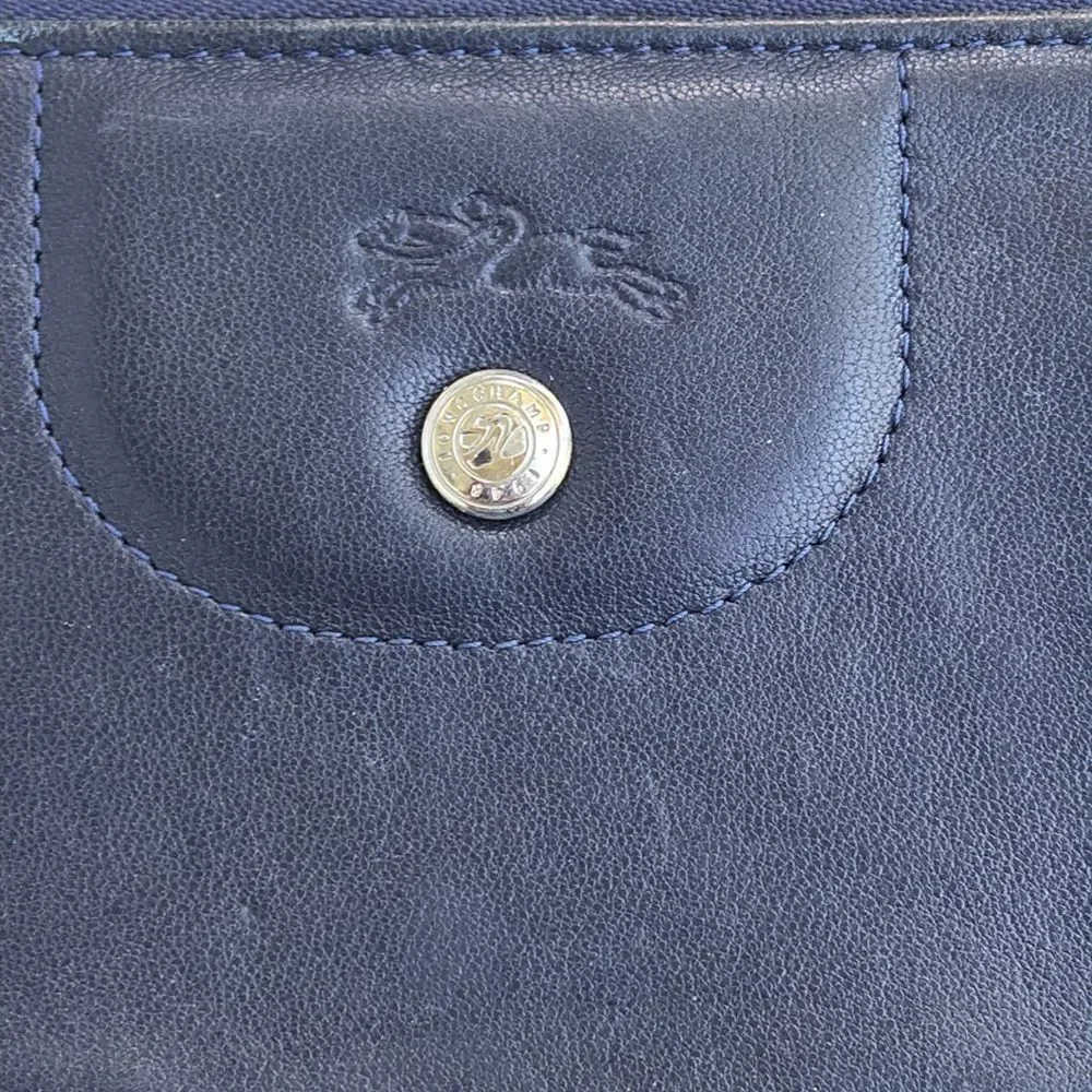 Longchamp check towards