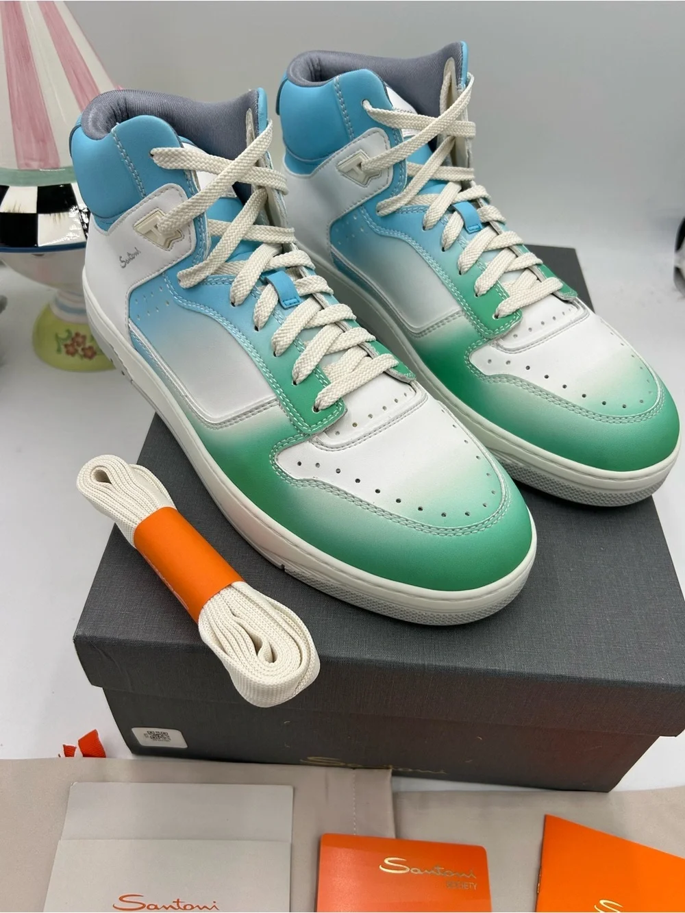 Santoni laces bags worn