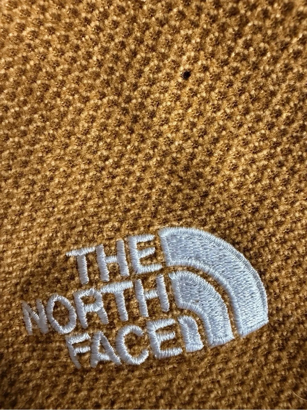 The North Face photo small logo