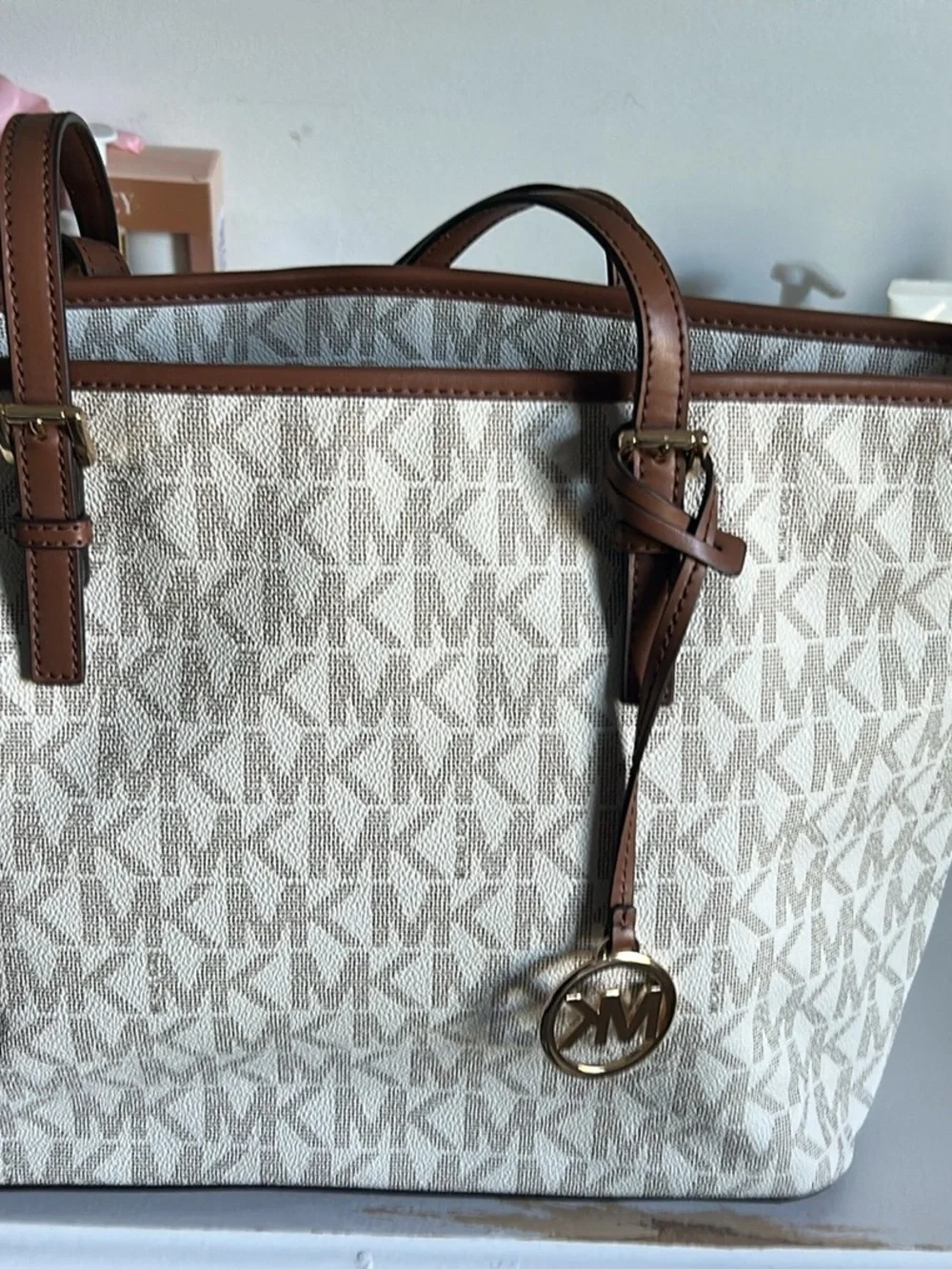 Michael Kors Cream Logo Tote with Brown Trim and Gold Charm