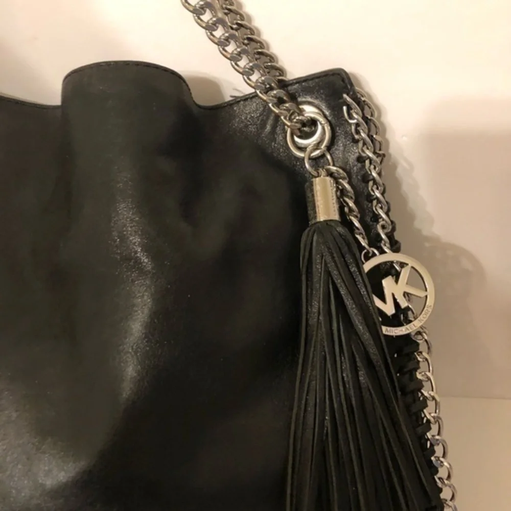 Michael Kors handles bag tarnished