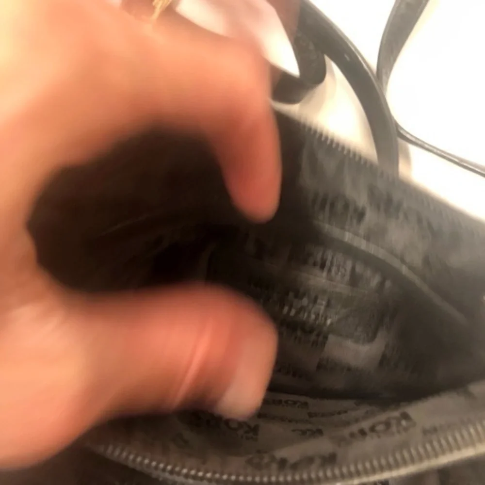 Michael Kors scratches logo