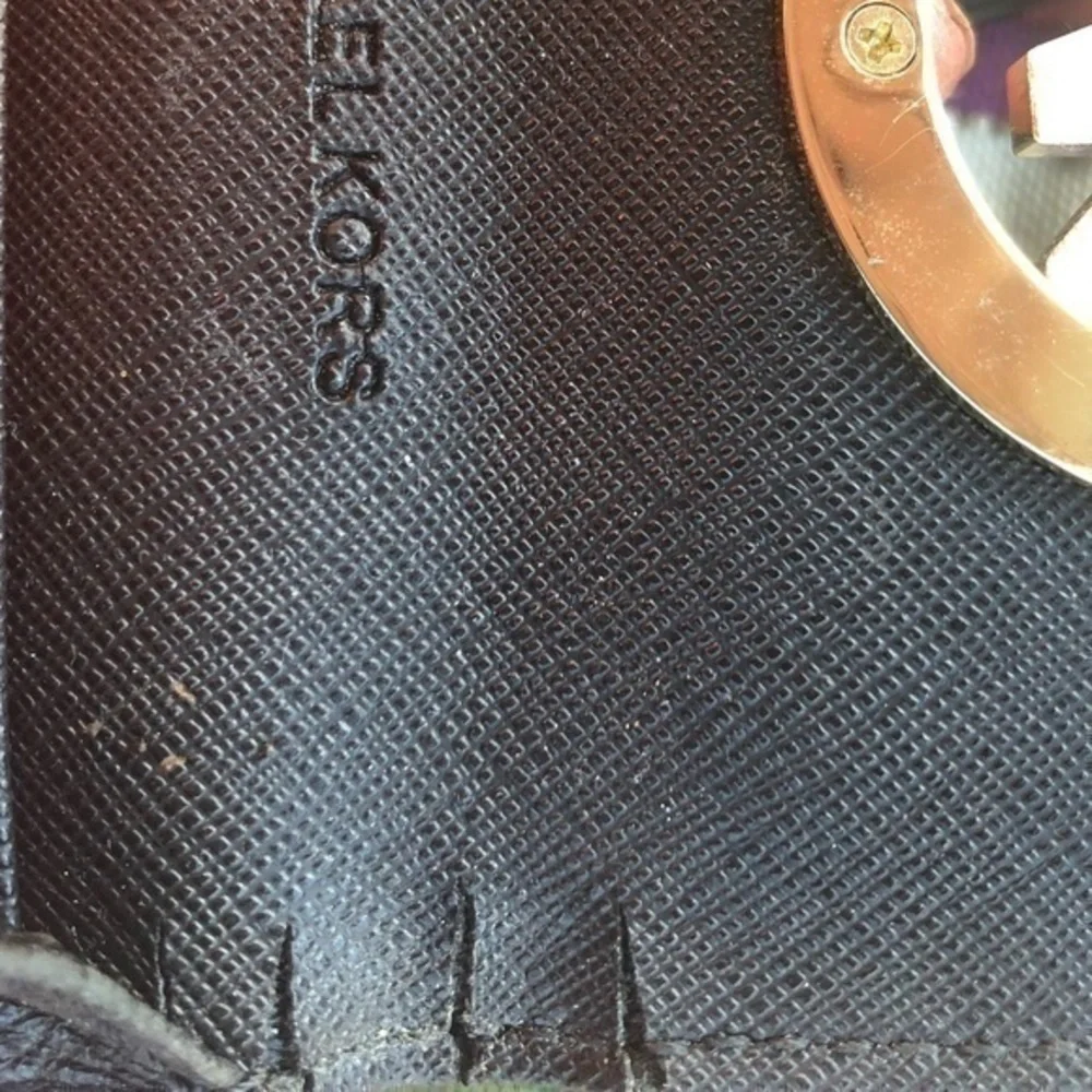 Michael Kors heavy use