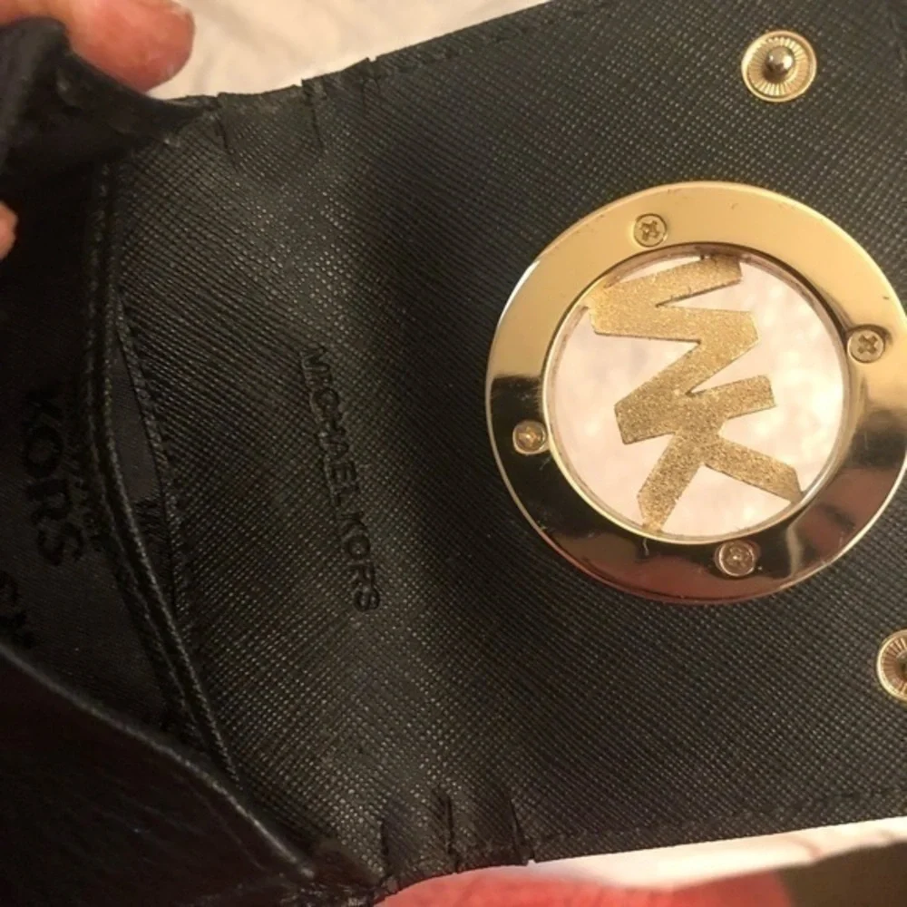 Michael Kors heavy use