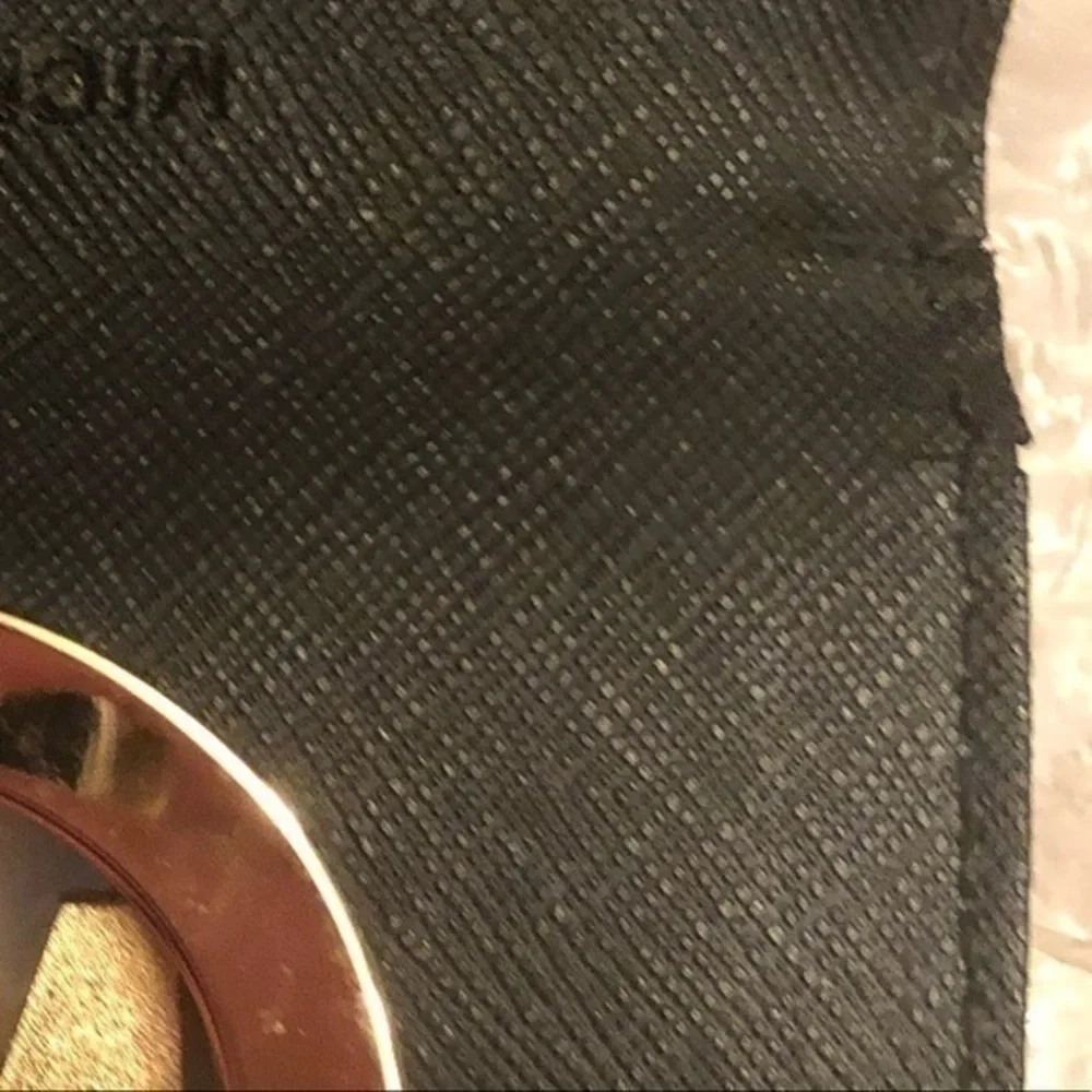 Michael Kors heavy use
