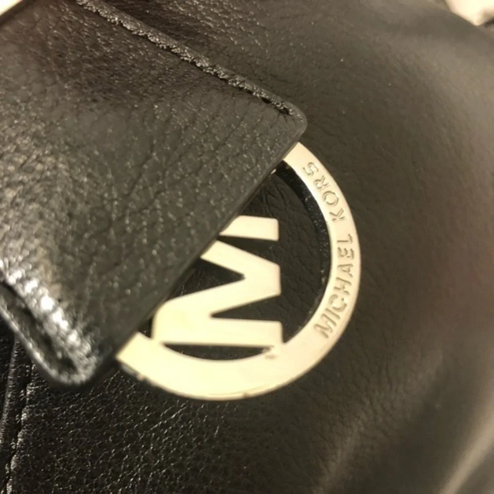 Michael Kors very gently