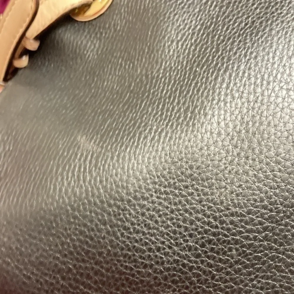 Michael Kors scuffs around
