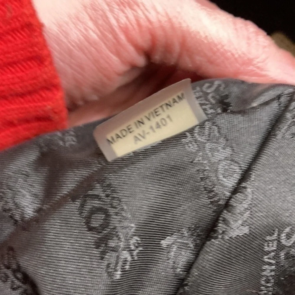 Michael Kors scuffs around