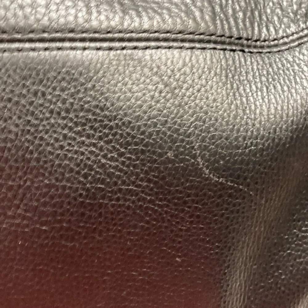 Michael Kors scuffs around