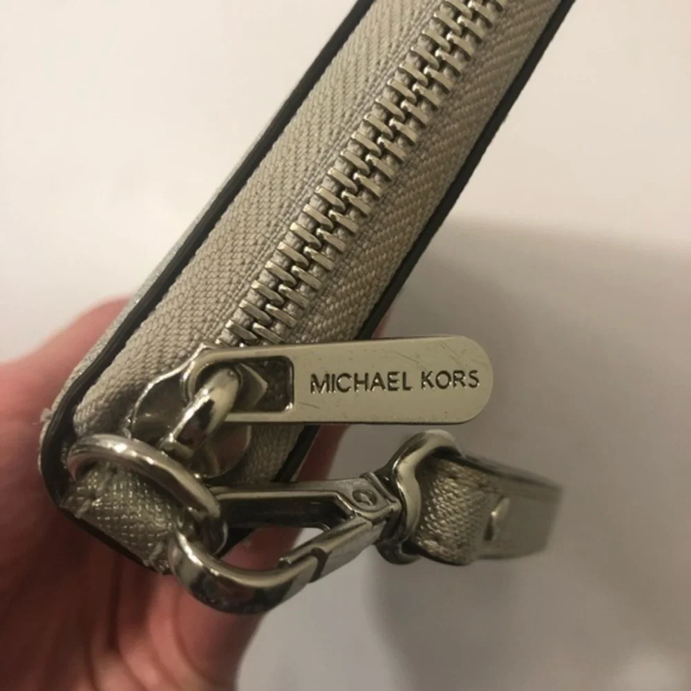 Michael Kors marks few tiny