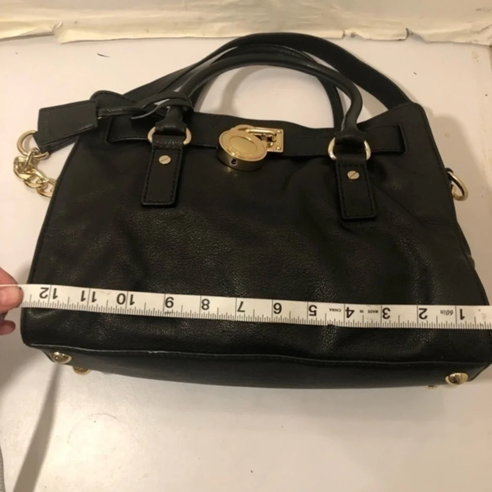 Michael Kors scuffs hardware very