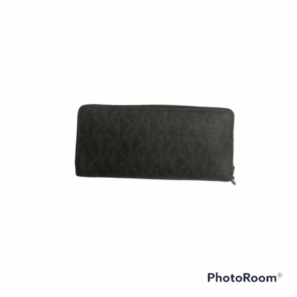 Michael Kors missing wristlet
