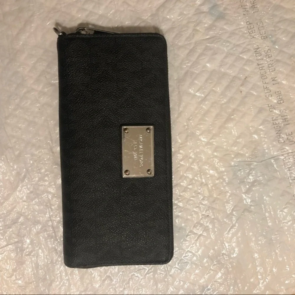 Michael Kors missing wristlet