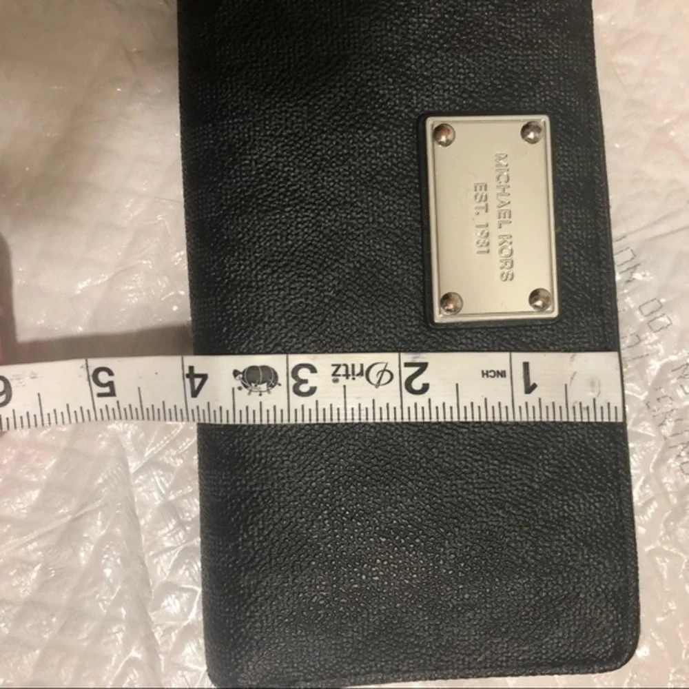 Michael Kors missing wristlet