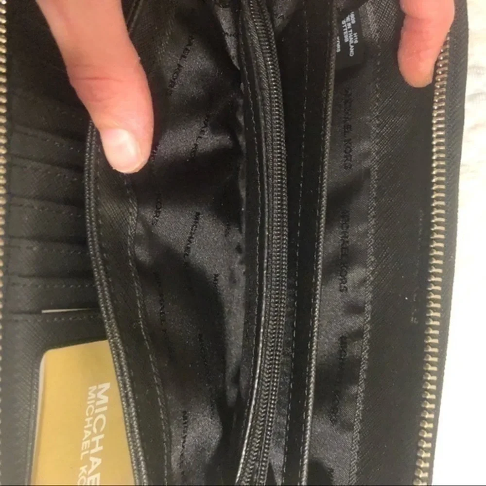 Michael Kors missing wristlet