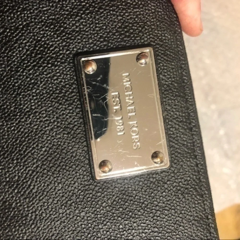 Michael Kors missing wristlet