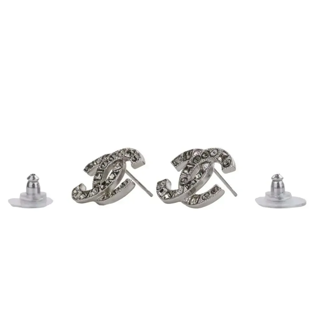 CHANEL silver logo
