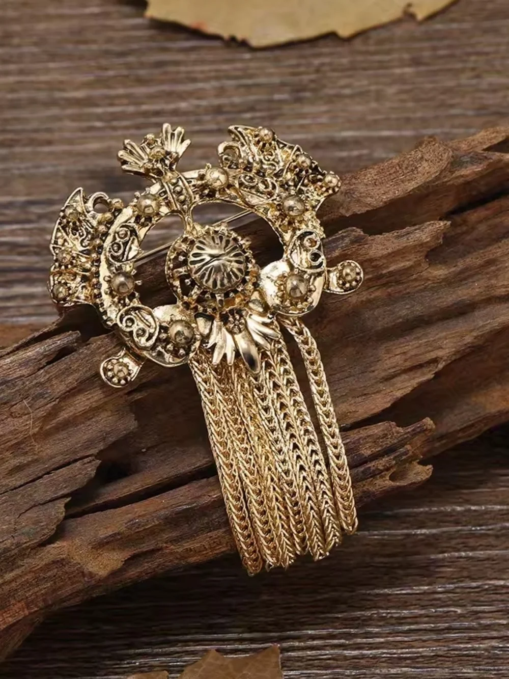 Anthropologie intricate gold