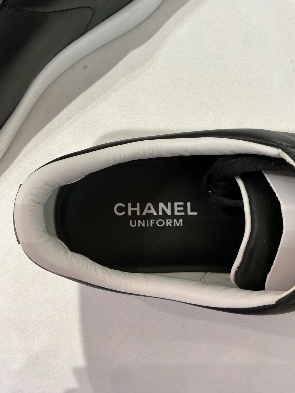 CHANEL black sneakers