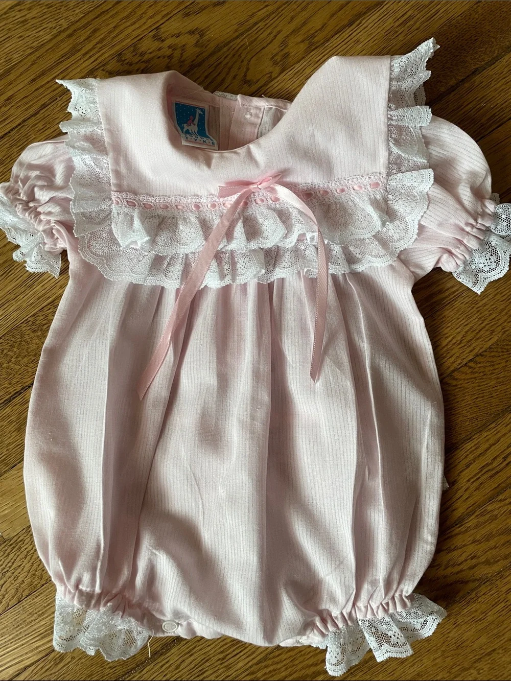 Pink Lace Bubble Romper with Satin Bow Detail