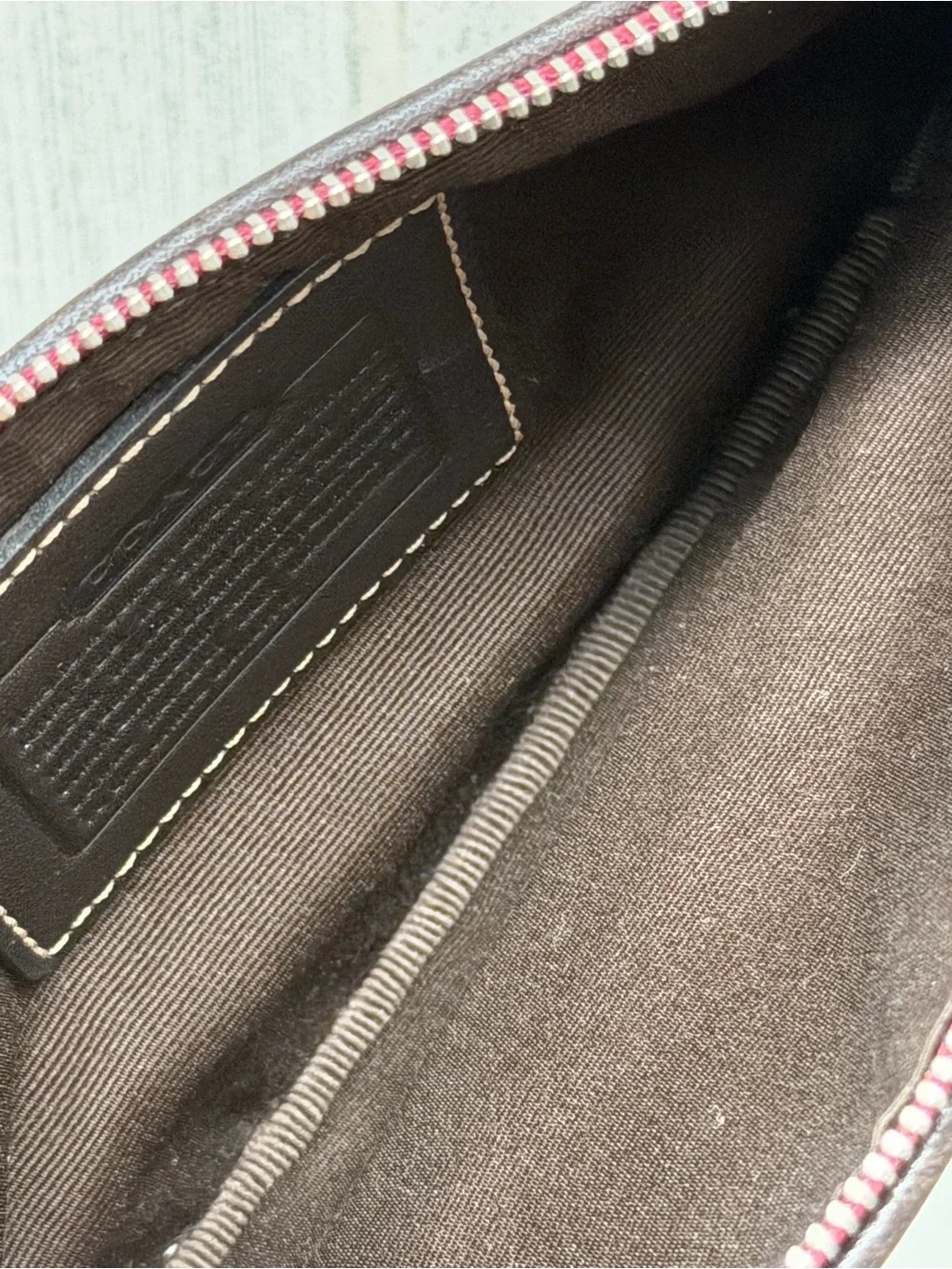 Coach felt wristlet