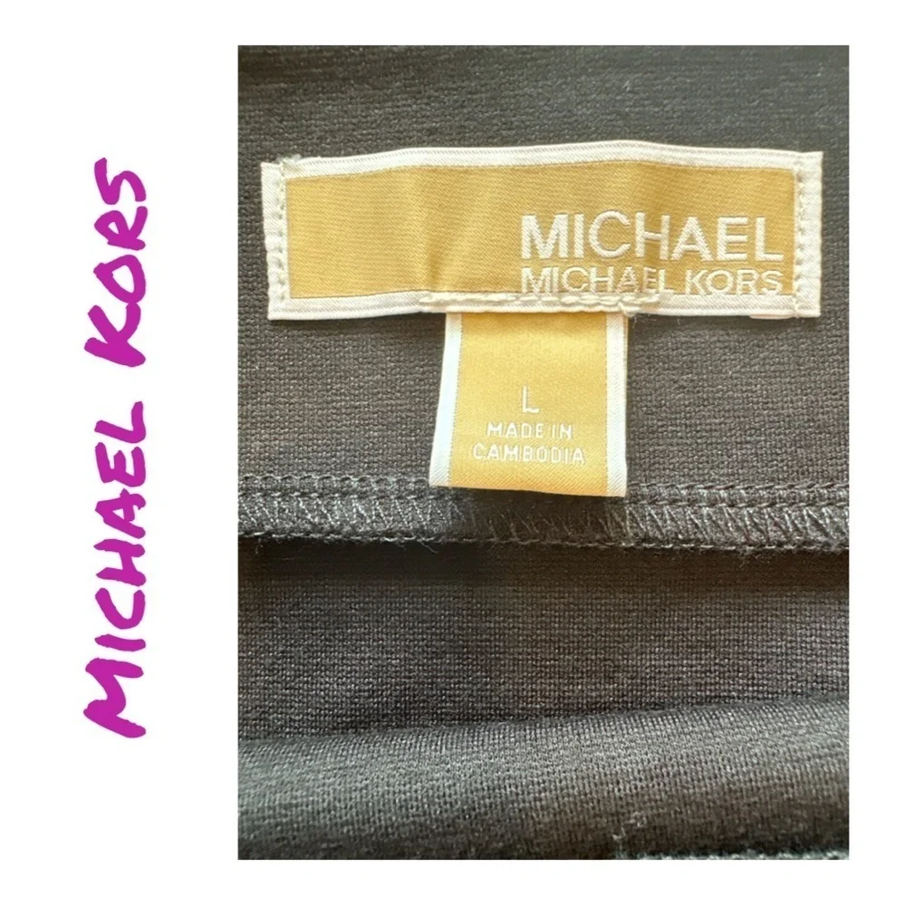 MICHAEL KORS Women's Black Skirt with Front Slit and Gold MK Buttons.