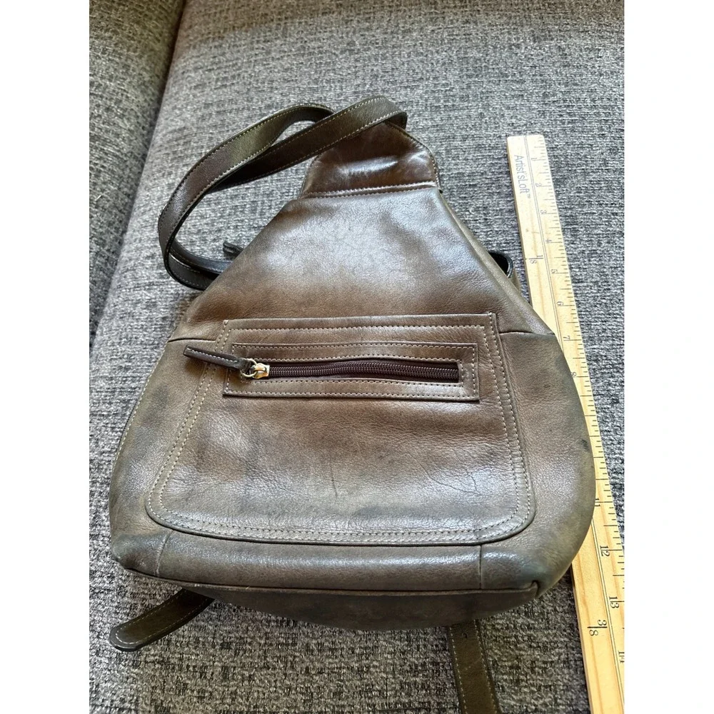 Tignanello sling backpack