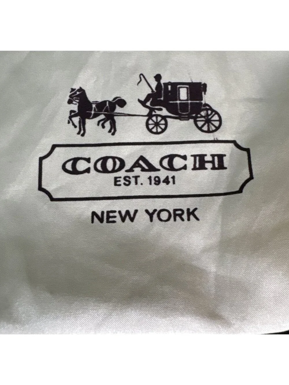 Coach authentic cream