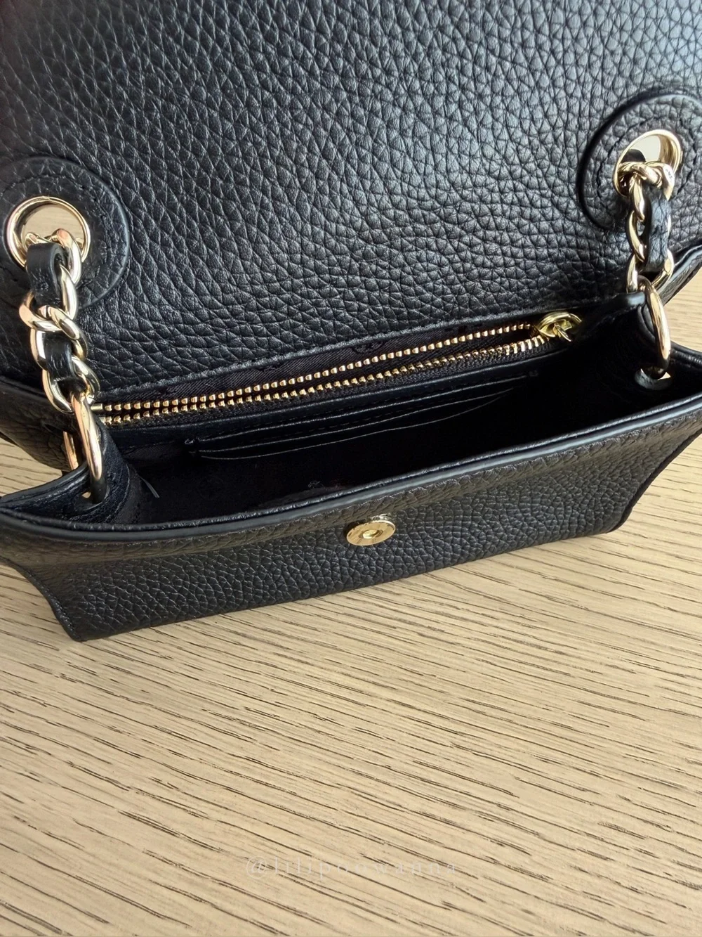 Tory Burch selling one