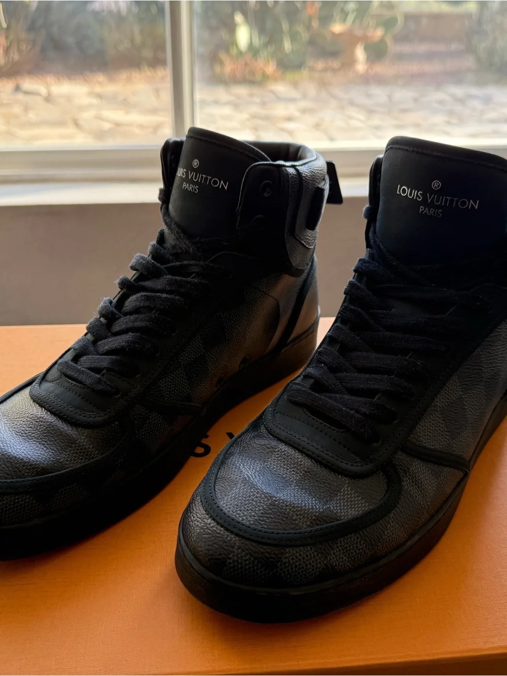 Louis Vuitton Men’s Black High-Top Leather Sneakers (authentication inside)