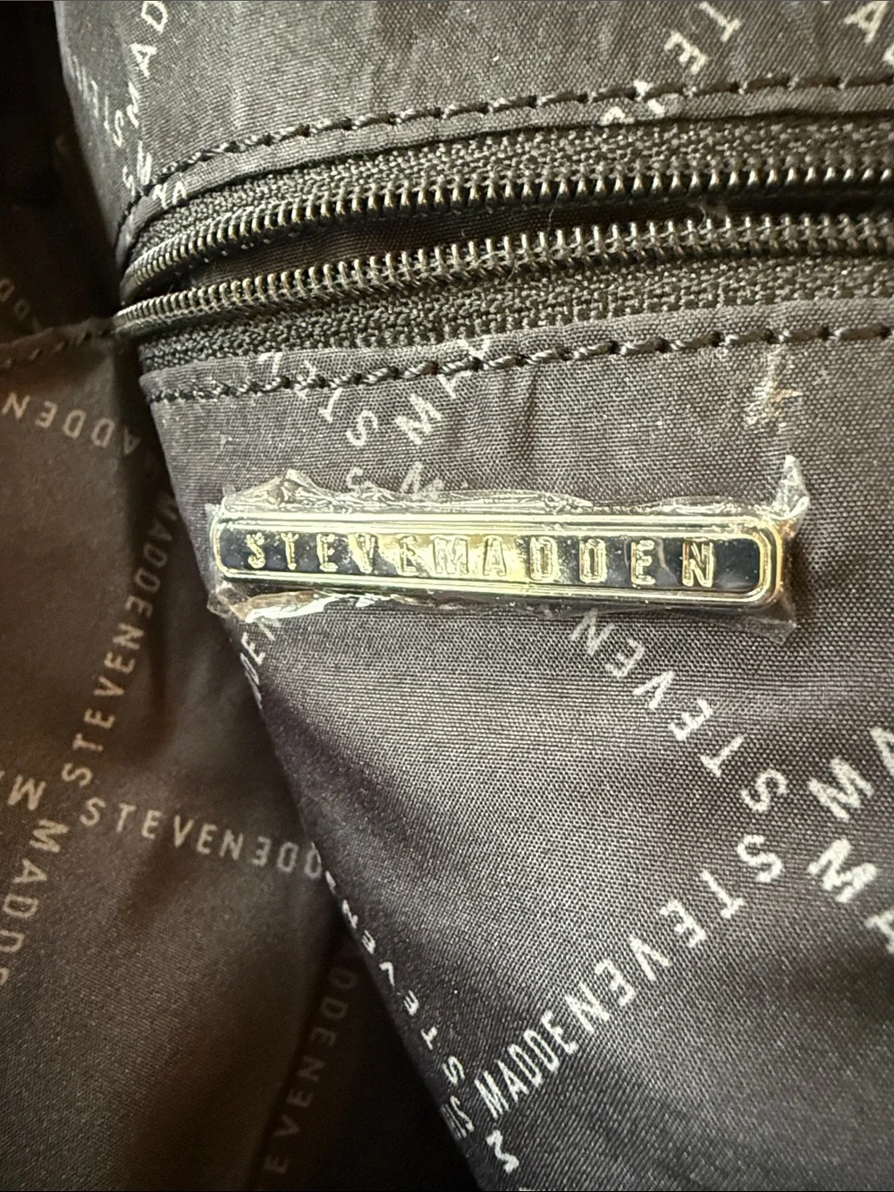 Steve Madden compact sling