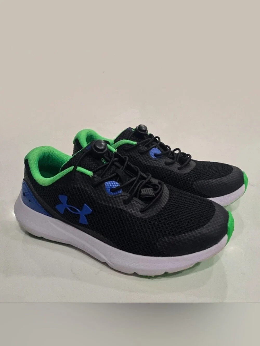 Under Armour Big Boys' Surge 3 Running Shoe Size 5.5Y