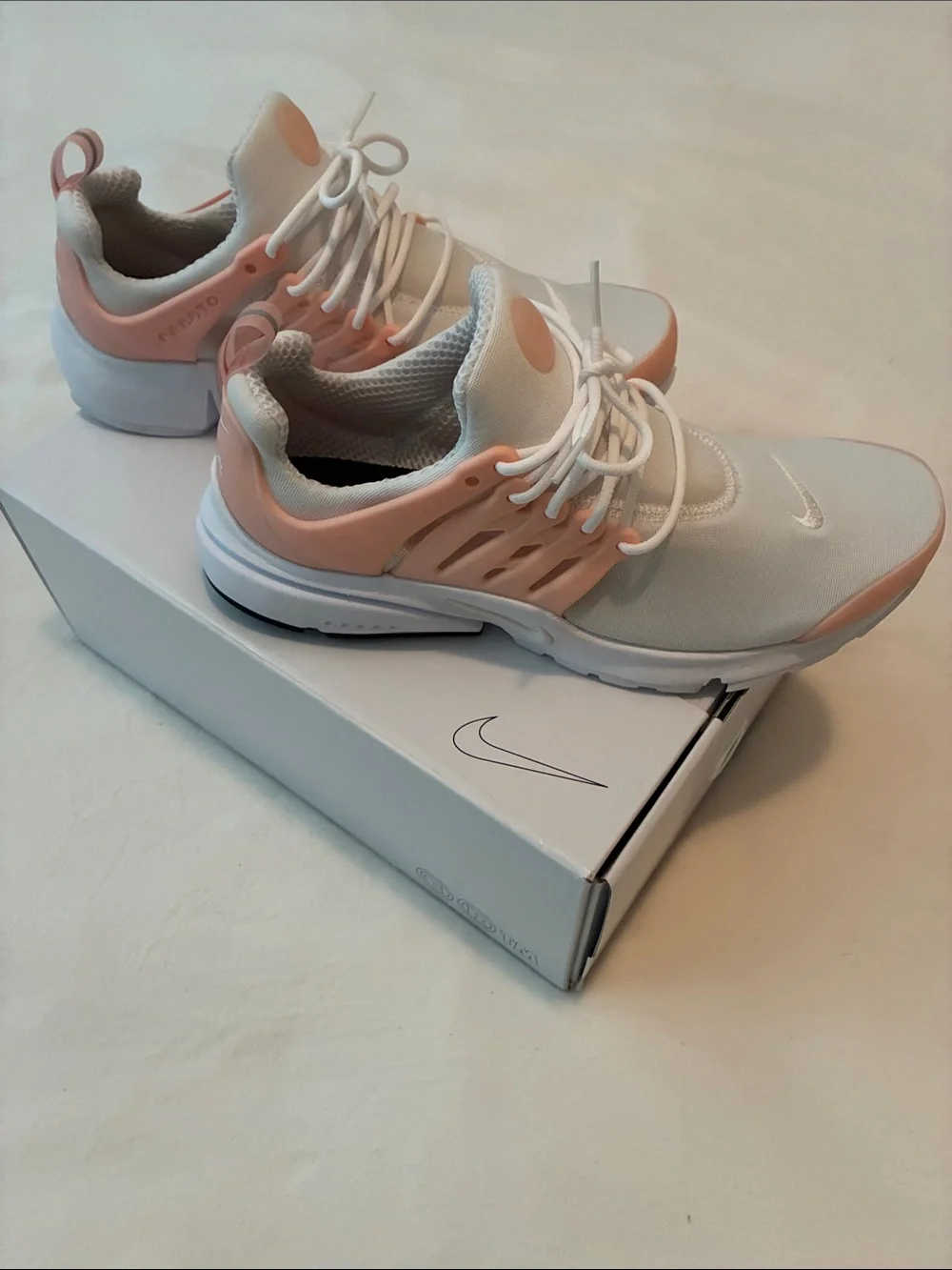 Nike Women’s White and Light Pink Low-Top Sneakers