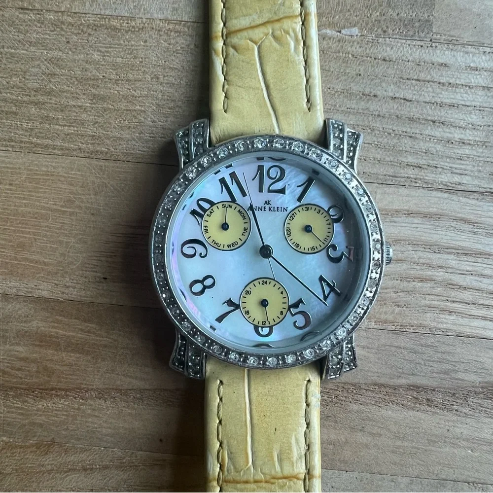 Anne Klein ladies silver tone yellow leather dress watch NEW BATTERY