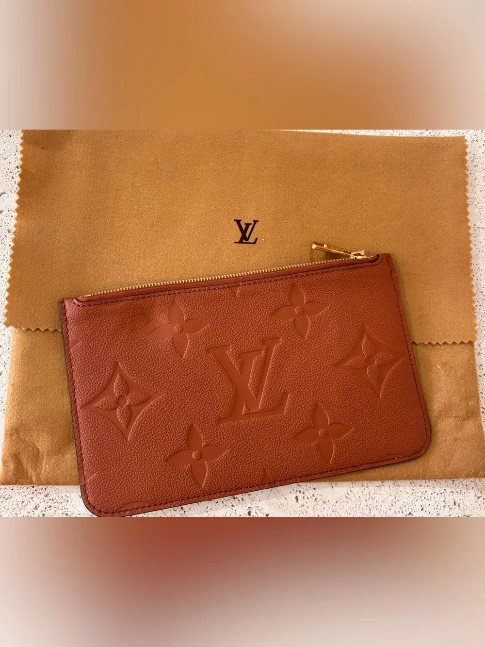 Authentic Louis Vuitton Neverfull Empreinte GM cognac pouch wristlet