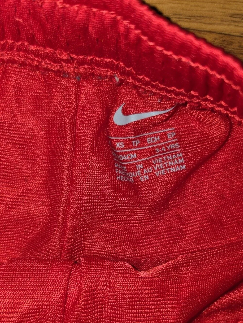 Nike Red Kids' Athletic Shorts with White Swoosh Accent