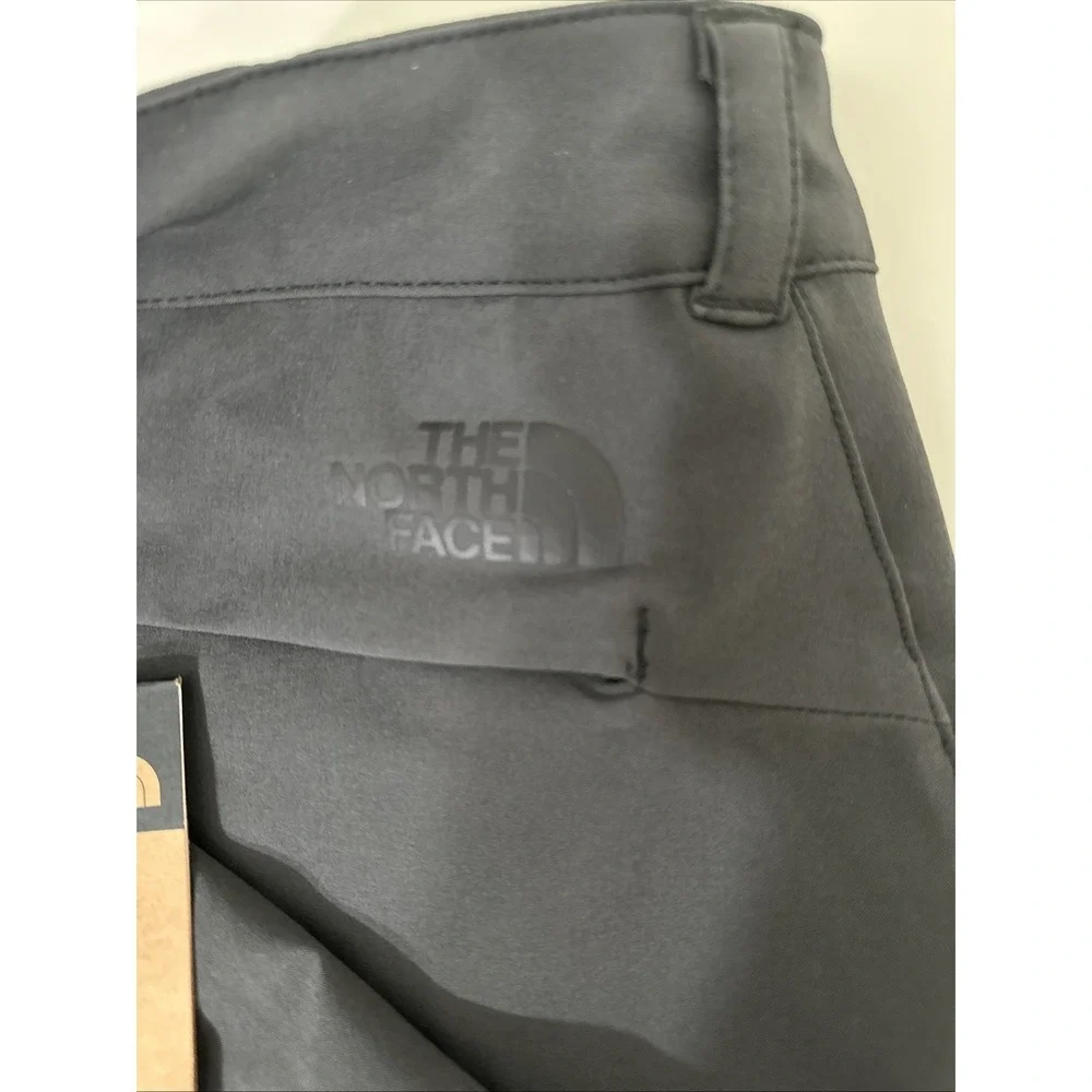 The North Face tags grey