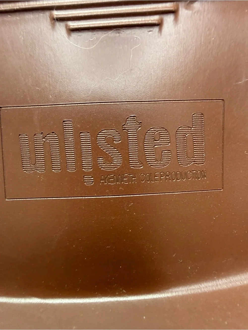 Unlisted by Kenneth Cole stylish grey