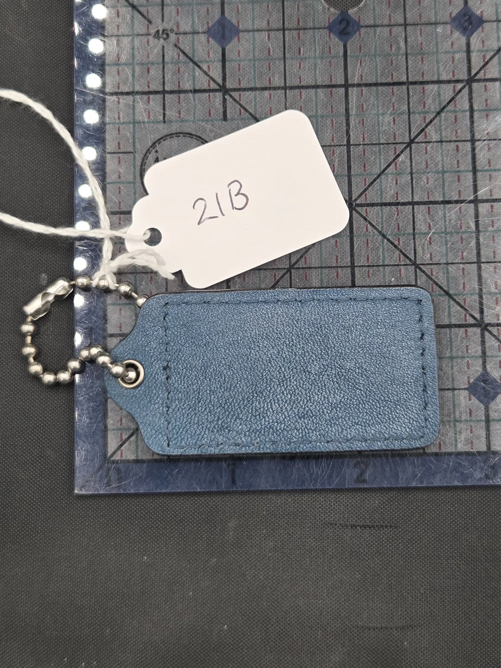 Coach leather tag