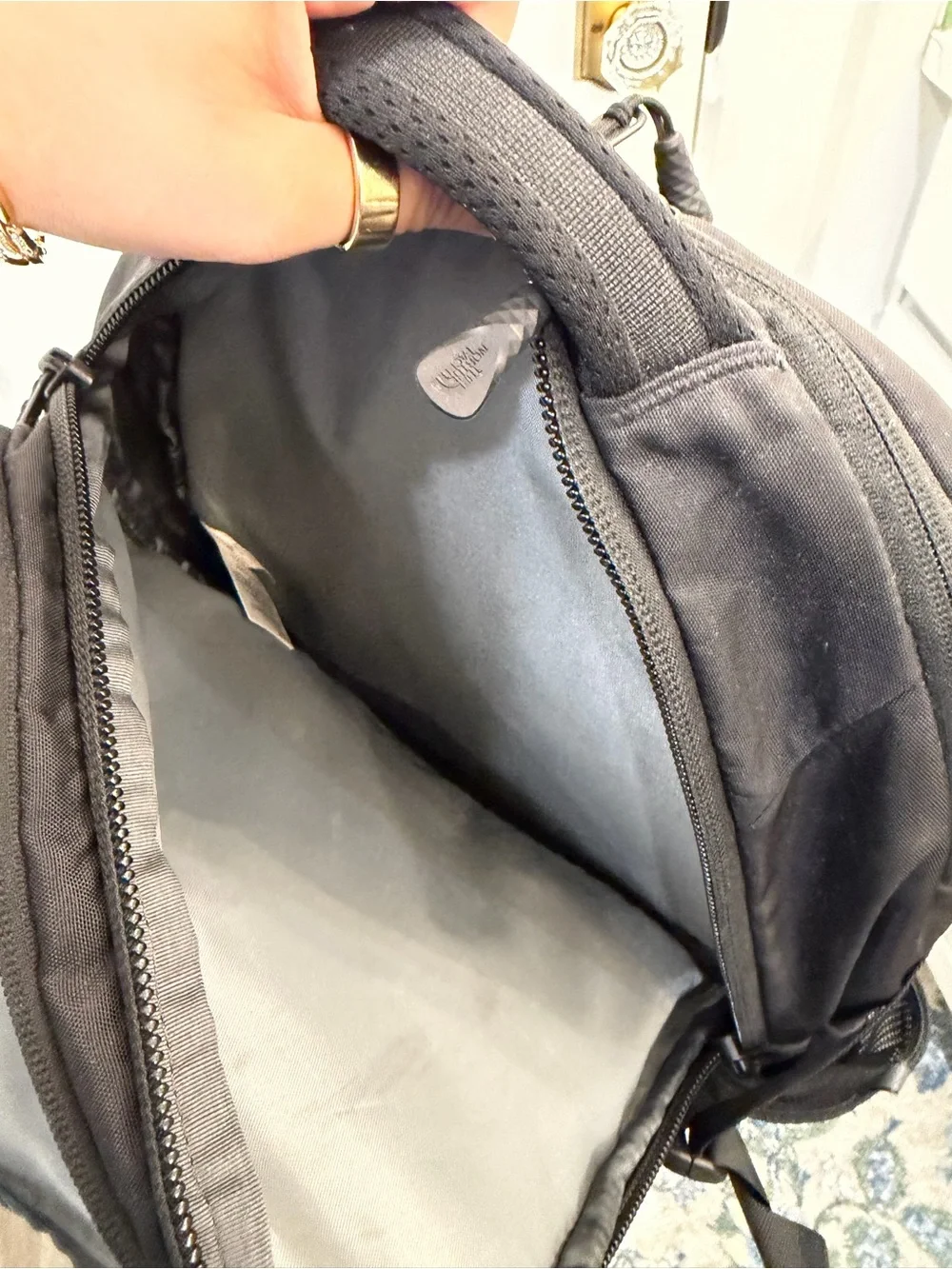 The North Face Black Backpack with Front Pocket and Buckle Straps