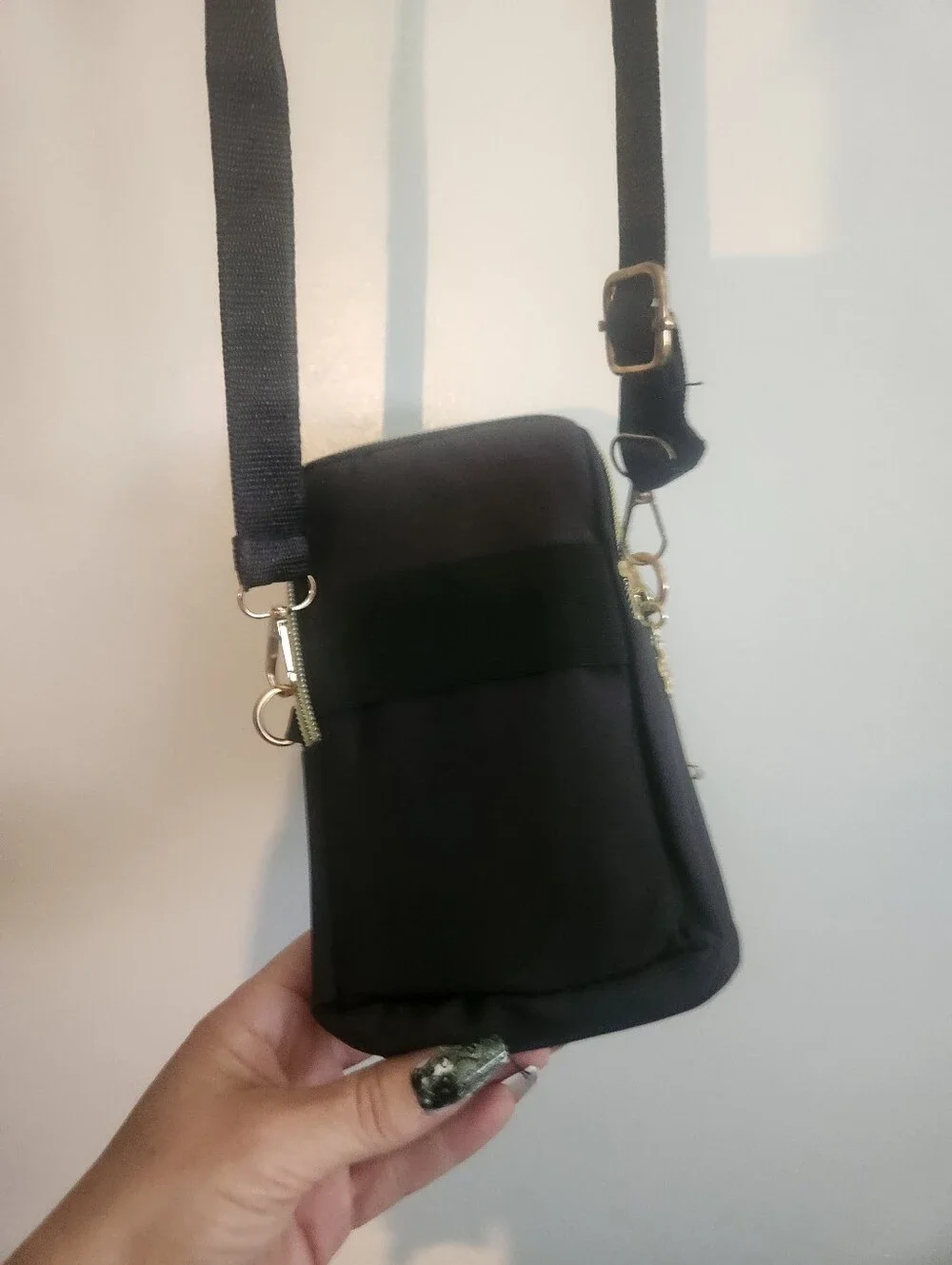 Source Unknown compact black